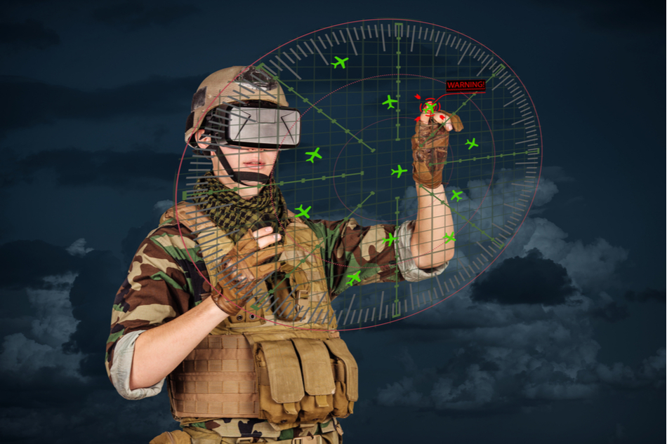 person in military clothing using VR eyeglasses