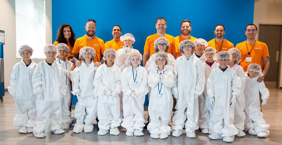 group photo kids in lab suits